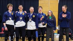 Members of Nova Scotia's championship team include, left, Griffin Hiltz, Mason Smith, Peter Parsons, Hayden Denouden, and coaches Linda MacRae Triff and Matt Bartley. (Contributed)